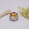 Bague ajustable en acier inoxydable avec cabochon à pois
