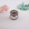 Bague ajustable à fleurs blanches et bleues