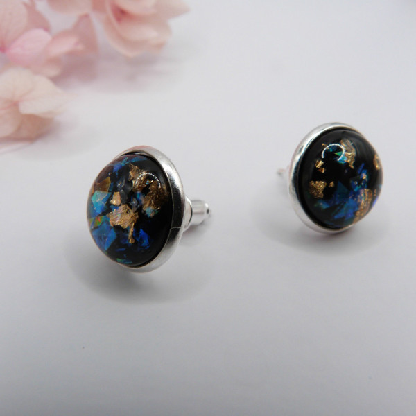 Puces d'oreilles noir avec des paillettes holographiques et dorées
