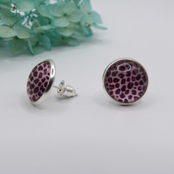 Puces d'oreilles rose léopard