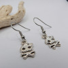 Boucles d'oreilles argentées tête de mort