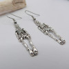 Boucles d'oreilles argentées squelette